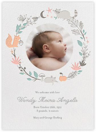 花のリースと写真の出産祝いカード